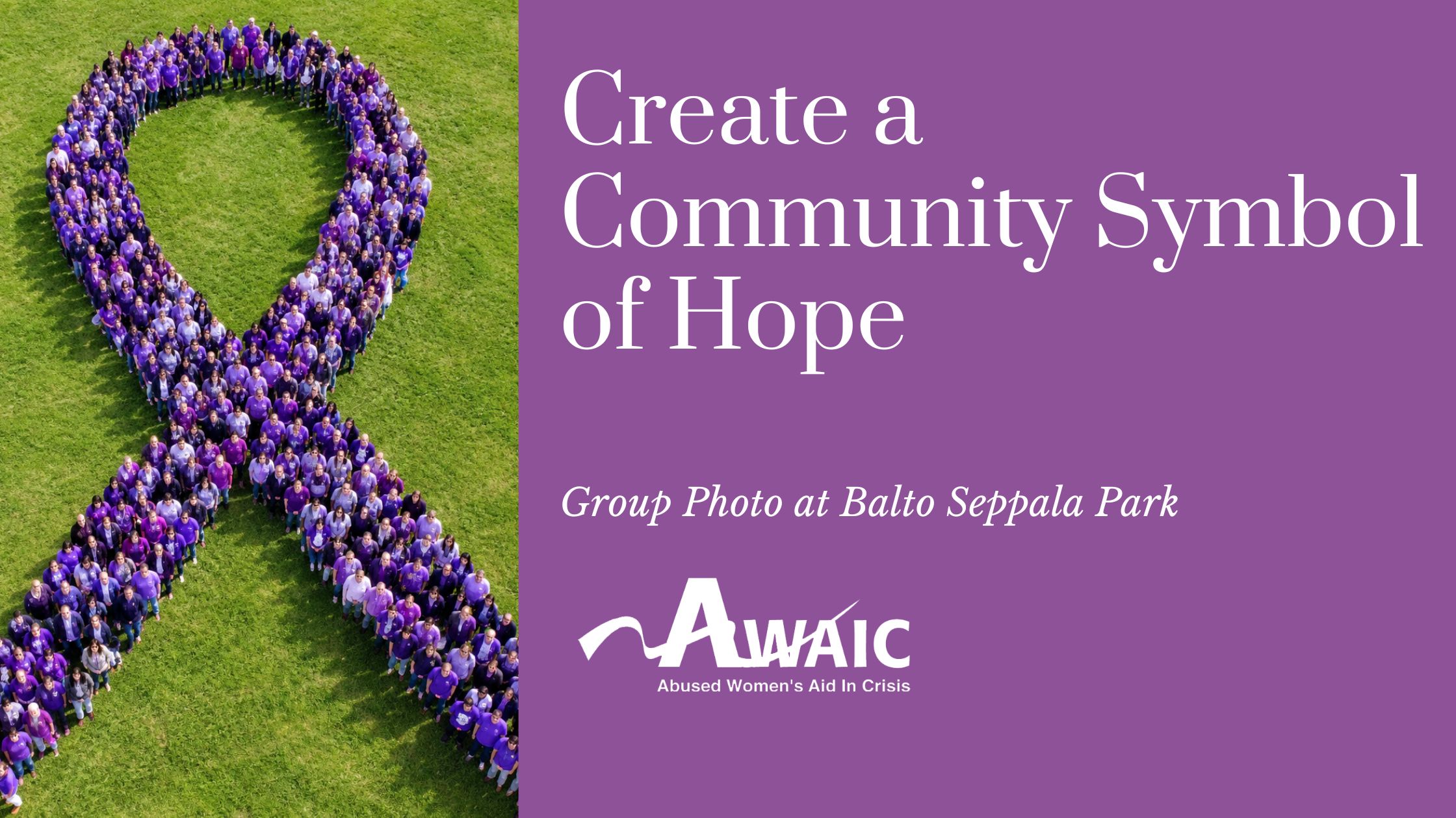 People stand together forming a giant ribbon for awareness.